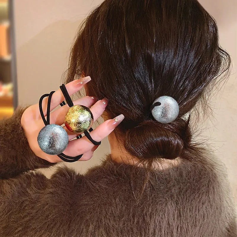 Resin ball hair band headdress hair ring with electroplated gold or silver finish, round head rope style hair accessory for practical hair styling and decorative use.