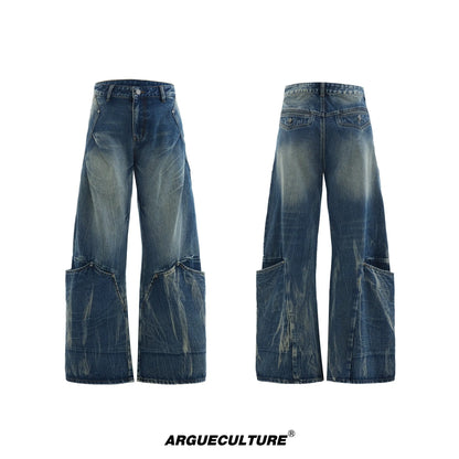 Men's verdant blue jeans with burst pattern, curved knife cut, and loose fit design