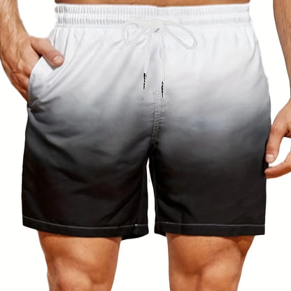 Men's grey gradient print sports shorts made from breathable mesh fabric, shown on a model.