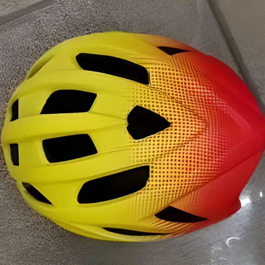 Orange cycling helmet with ventilation holes for mountain and road biking