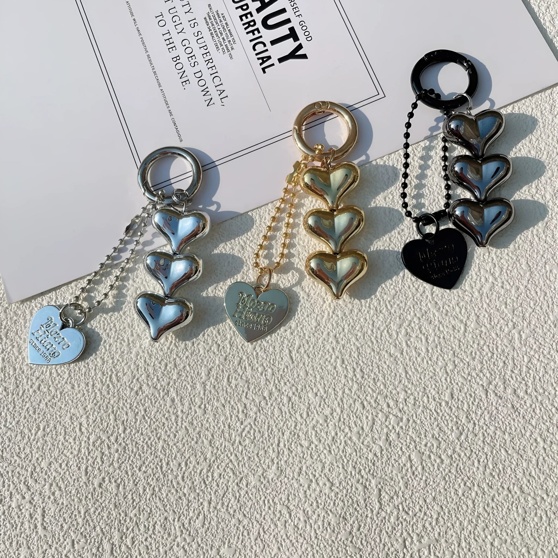 Acrylic peach-shaped key ring with love heart design and electroplated finish