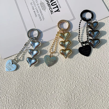 Acrylic peach-shaped key ring with love heart design and electroplated finish