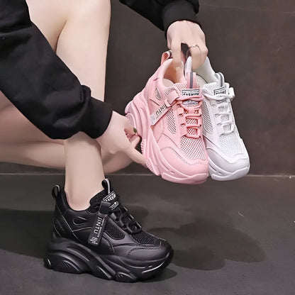 Women's black mesh platform casual shoes with a hollow-out design and a toe-holder strap.