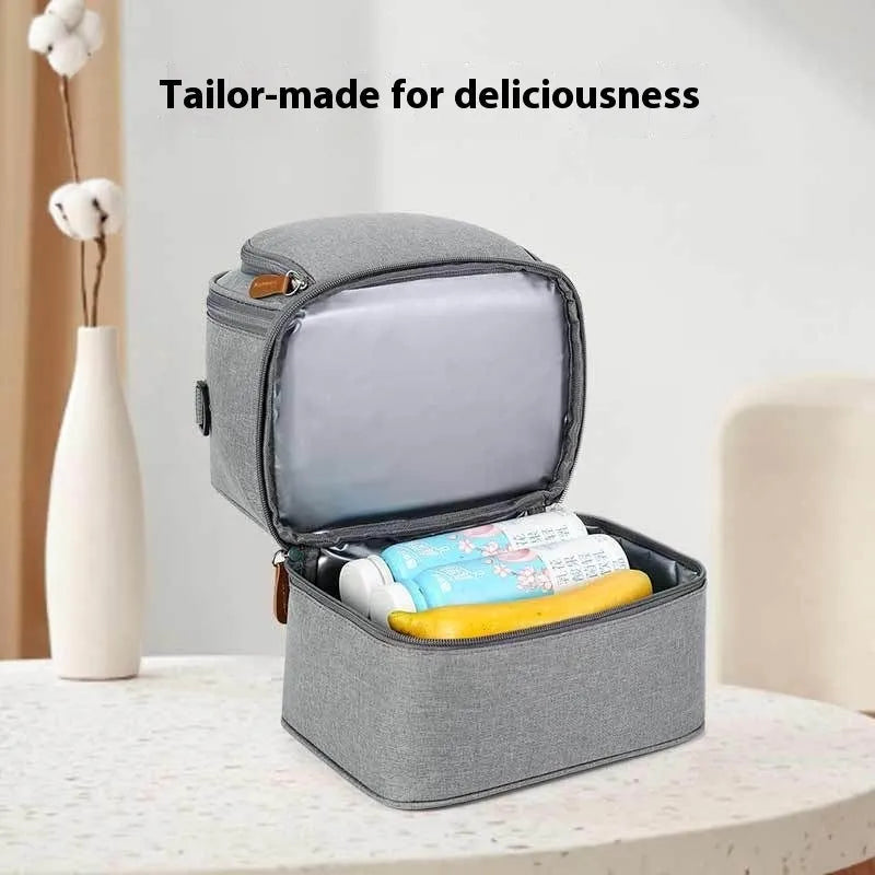 Grey women's thermal insulation backpack made from Oxford cloth with curved shoulder straps