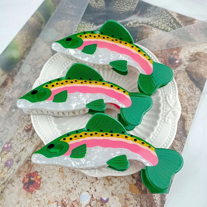 Dark green PVC hair clip with detailed carp design measuring 8cm in length