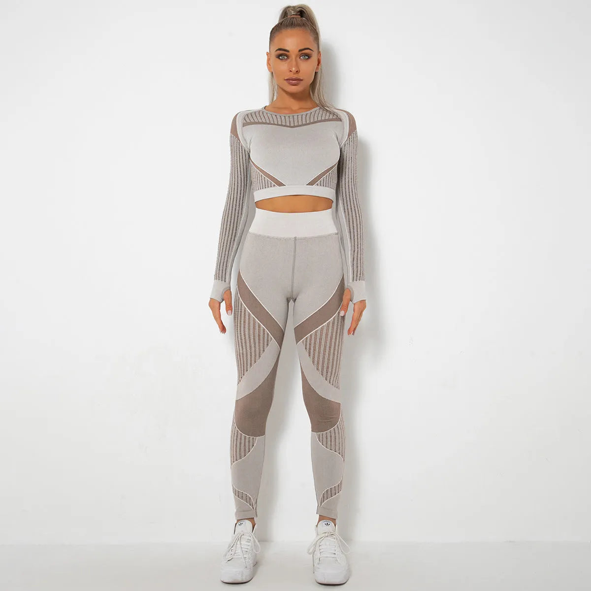 Seamless knitted yoga wearsuit for women in long-sleeved design with stripe pattern