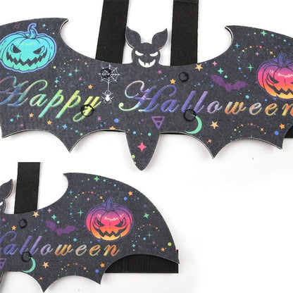 Halloween costume for a cat featuring batwing sleeves, made from felt, in orange pumpkin bat design.