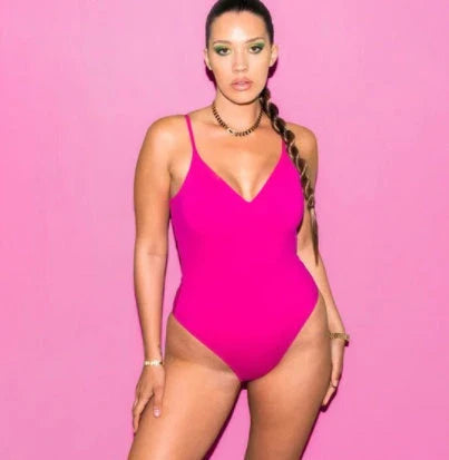 A stylish, backless one-piece swimsuit in a variety of vibrant colors for women's summer fashion.