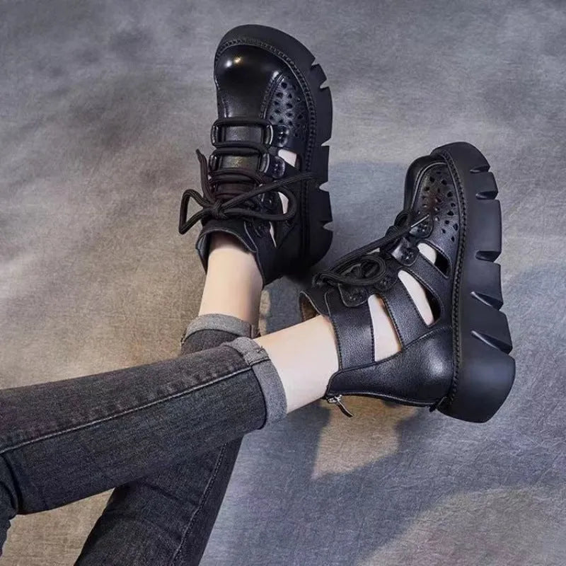 Women's platform sandals with hollow hole design in soft cowhide leather, shown in black colour with sporty styling