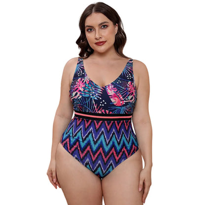 Blue and white printed women's one-piece swimsuit with spaghetti straps and a striped vest design.