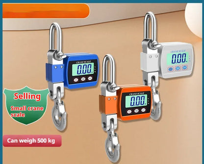 Electronic hook scale with digital LCD display showing weight measurement, available in blue, orange, or white colours