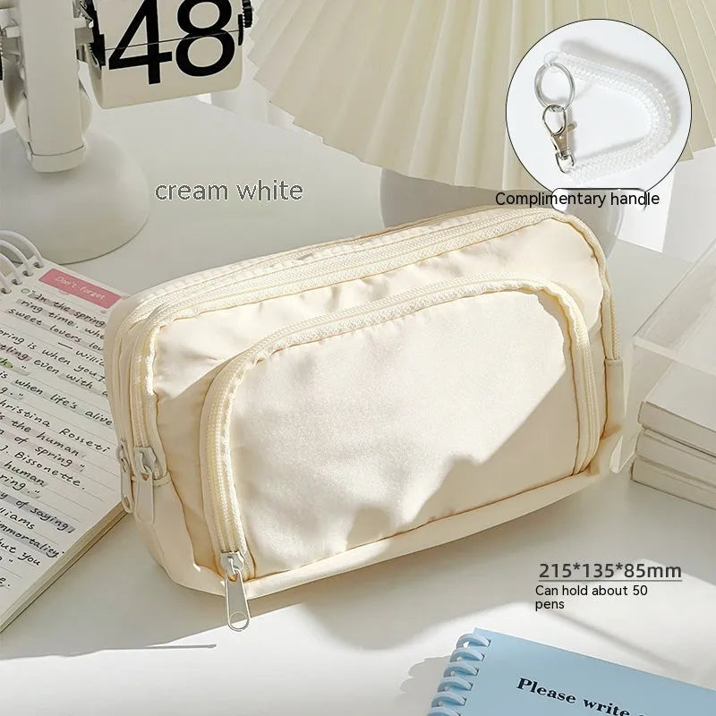 Solid colour double-layer pencil case for high-capacity exam stationery organisation.