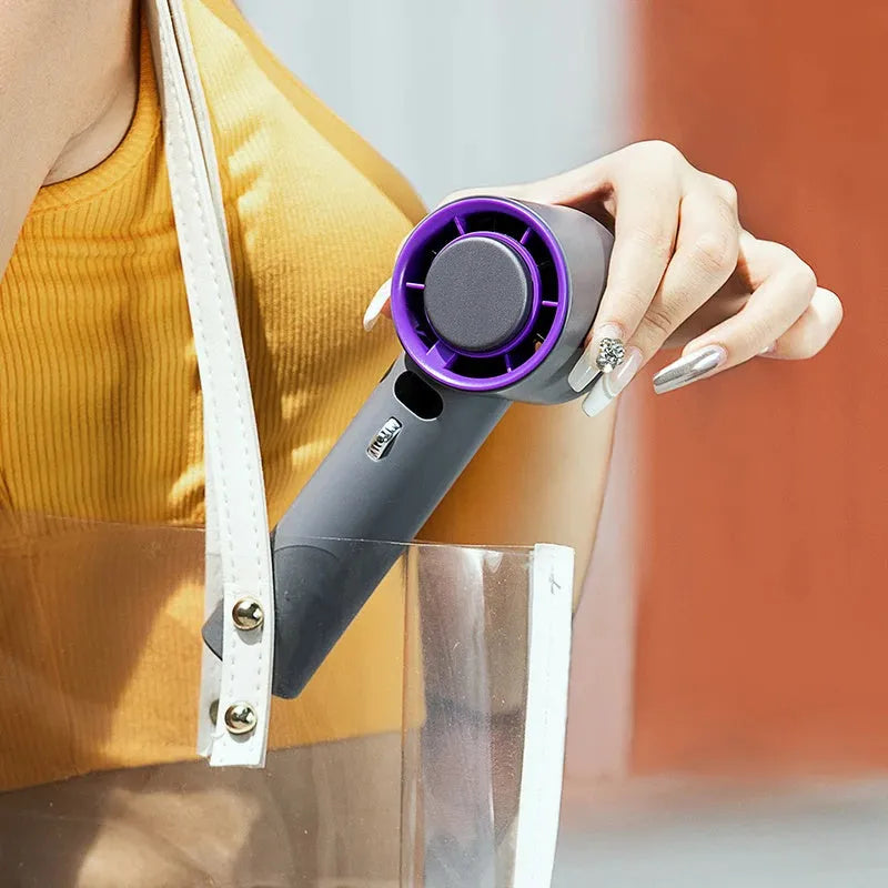 Portable handheld fan with semiconductor cooling, 3000mAh battery, and adjustable wind speeds
