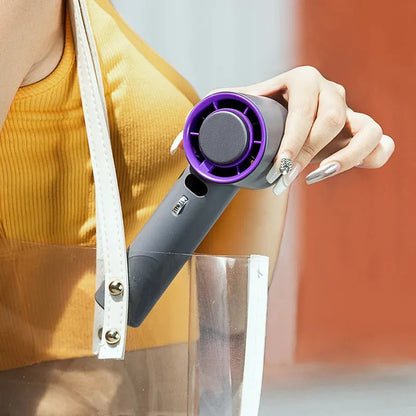 Portable handheld fan with semiconductor cooling, 3000mAh battery, and adjustable wind speeds