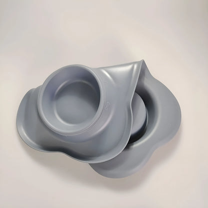 Large silicone dog bowl with stainless steel insert in five colour options on kitchen floor