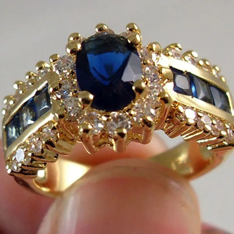 Personalised diamond-treated zinc alloy rings in blue and purple designs with size options 6-11