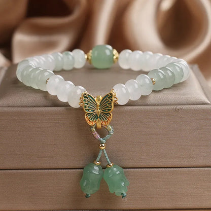 Green crystal abacus beads bracelet with retro butterfly charm and tassel decoration