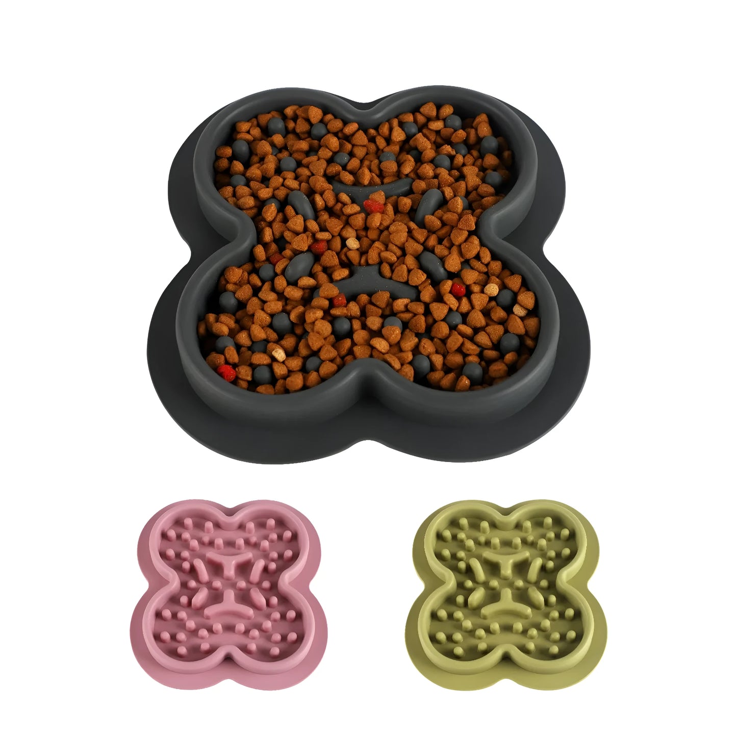 A raised silicone pet licking pad placed on a floor, showing its textured surface and non-slip base.