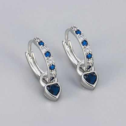 Women's fashion earrings with heart-shaped eardrops, diamond-treated gemstones in gold or white gold plating, approximately 2.5 cm long