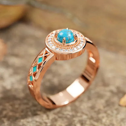 Rose gold copper women's ring with geometric design and inlaid turquoise zircon stones.