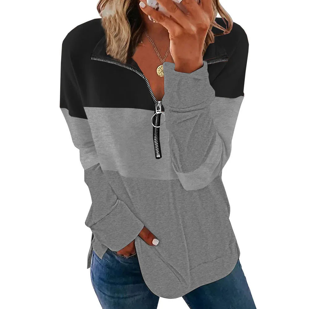 Women's loose long-sleeved leopard print pullover sweater on a hanger, showing colour options.