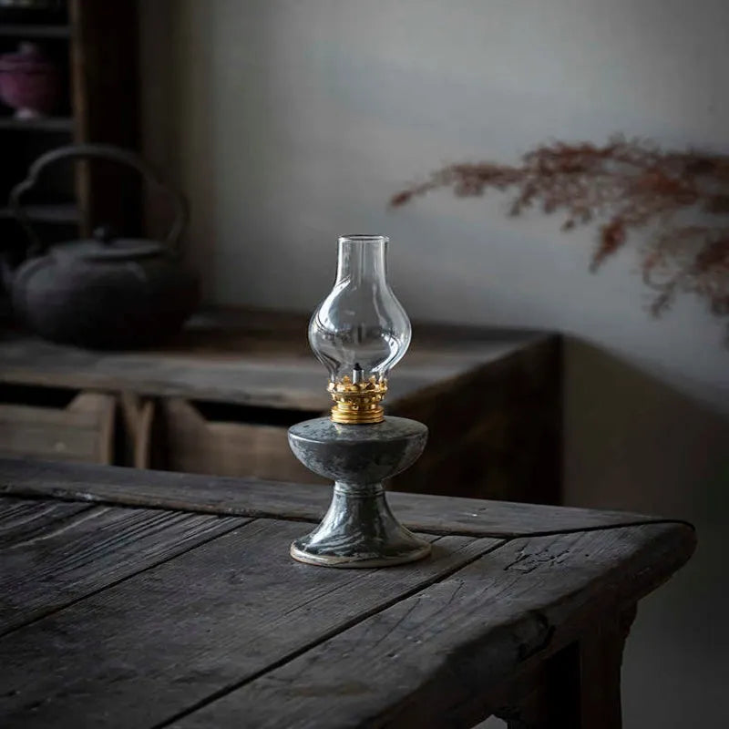 Black handmade ceramic kerosene lamp night light with retro split design, 23.8cm tall and 7.8cm wide