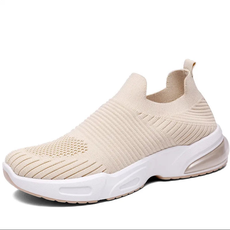Slip-on breathable mesh sock shoes with a low-top design and PVC sole, shown in a neutral colour.