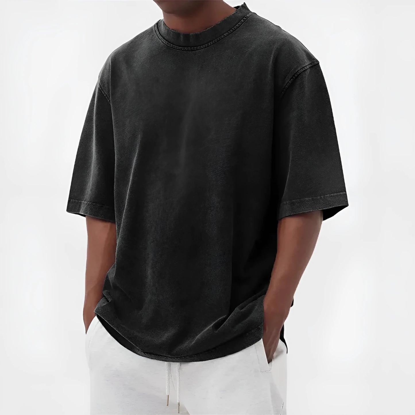 Men's loose fit stone-washed distressed short sleeve t-shirt in solid colour