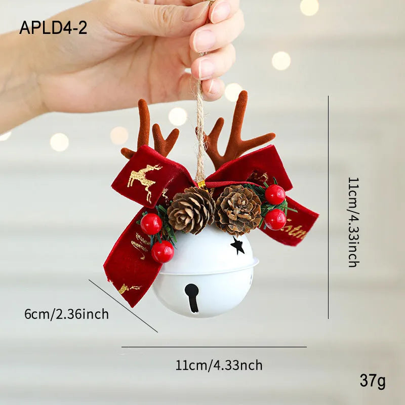 Wrought iron decorative pendant with antlers, pine cone, bowknot, and a small bell in a choice of colours.