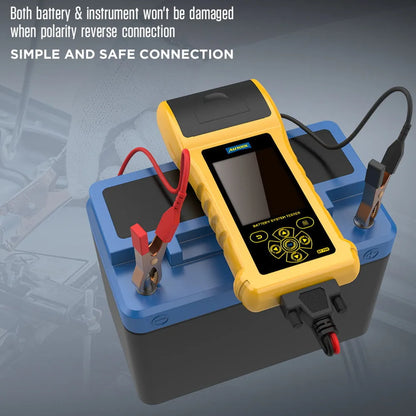 Autool BT760 vehicle battery tester with colour screen, test clips, and printed diagnostic receipt on a workshop bench.