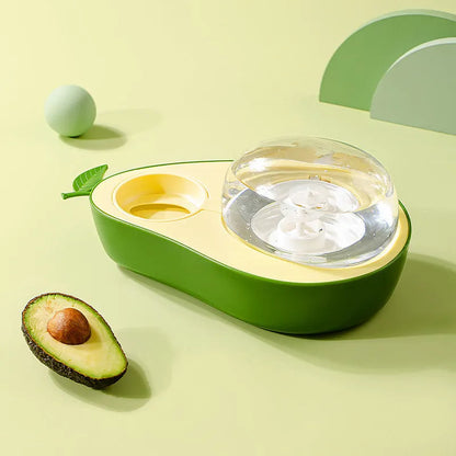 Avocado-shaped pet feeder with automatic water dispenser bottle and slow feed bowl in green colour