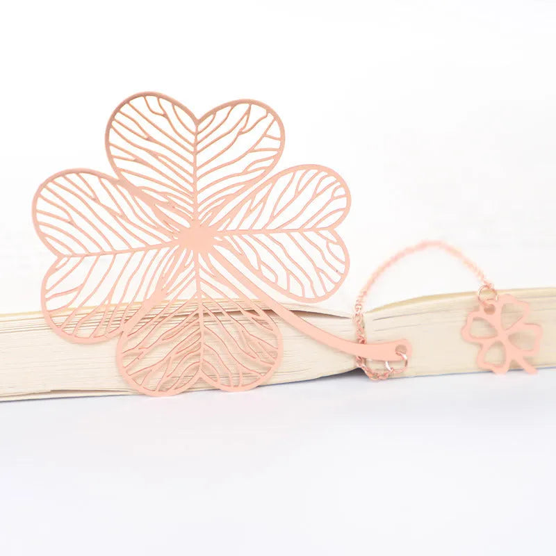 Brass metal bookmark with hollow plating leaf design and rose gold tassel decoration
