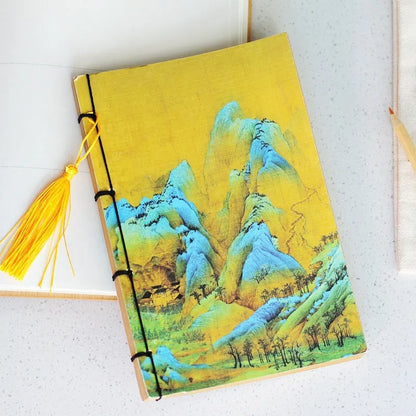 A5 antique wire-bound notebook with classical artwork cover, black oil wax rope binding, and decorative tassels
