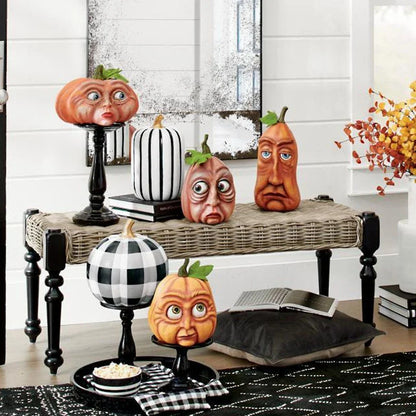 Premium resin pumpkin props in various sizes and expressions for spooky Halloween decor