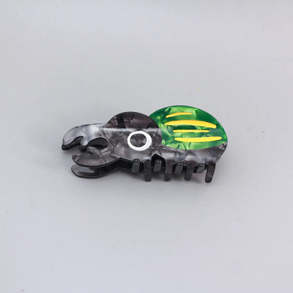 Handmade cellulose acetate beetle grip with caterpillar element in cartoon style decorative clip