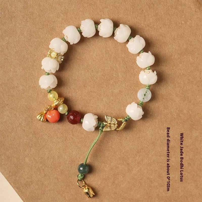 White jade Bodhi bracelet with lotus and pumpkin beads on open rope design