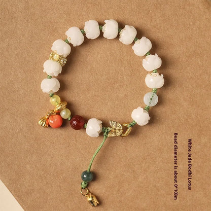 White jade Bodhi bracelet with lotus and pumpkin beads on open rope design