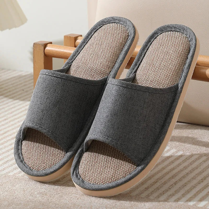 Women's open-toe linen slippers with thick sole in light brown colour.