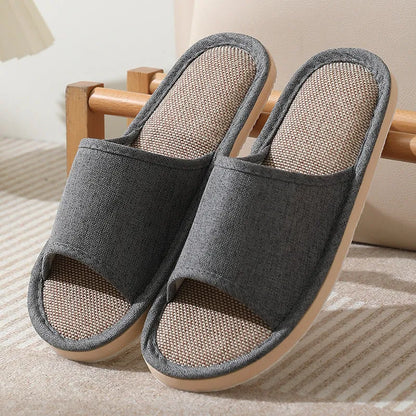 Women's open-toe linen slippers with thick sole in light brown colour.