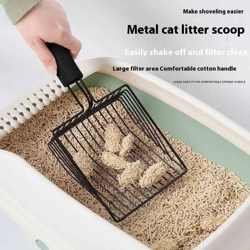 Black metal cat litter scoop with a 0.8cm gap between its tines on a white background.