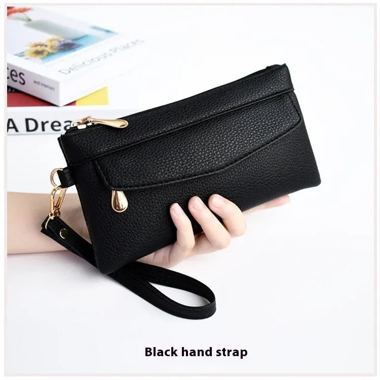 Soft surface square PU crossbody bag and clutch with internal zipper pocket in various colours.