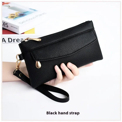 Soft surface square PU crossbody bag and clutch with internal zipper pocket in various colours.