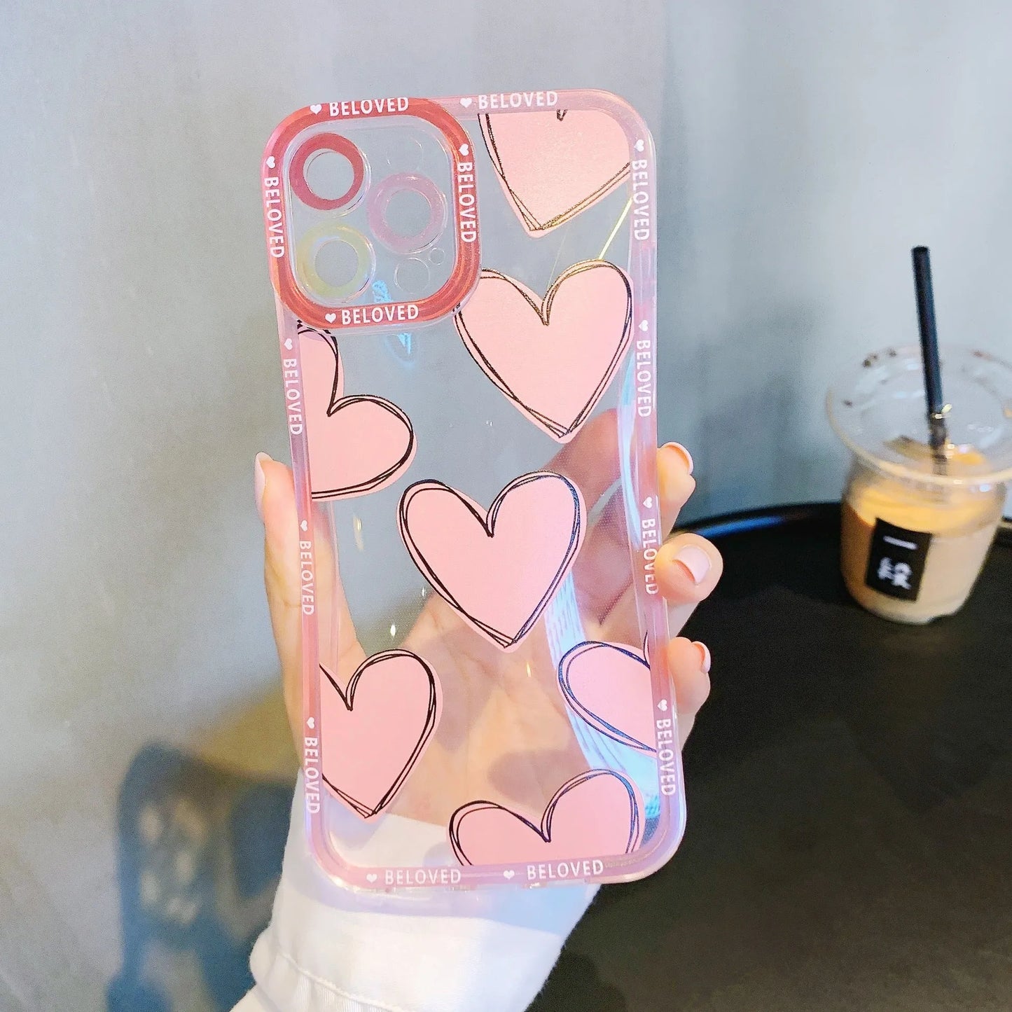 Pink and graffiti red TPU iPhone cases featuring love heart and angel eye designs for multiple models