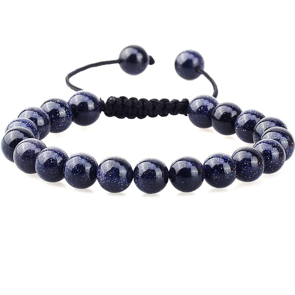 Women's flat knot braided healing bracelet hand-woven with natural gemstone beads in geometric pattern