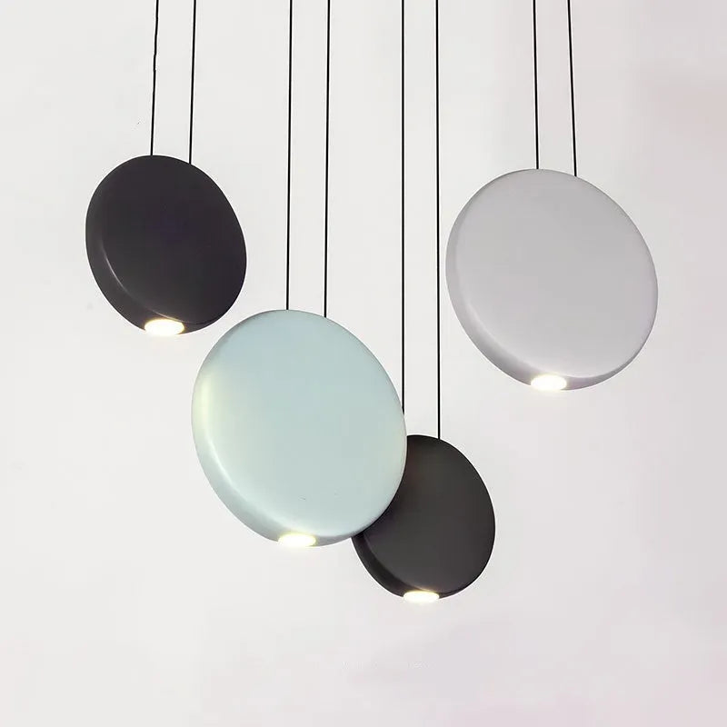 Cosmos design resin bedroom chandelier with round bar, trumpets, and spheres, showing adjustable height.