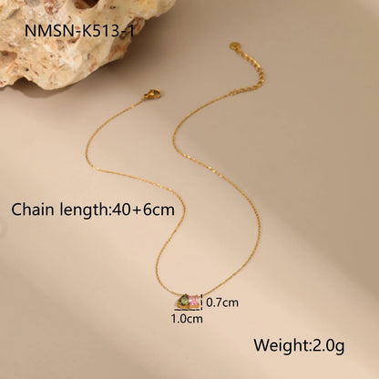 Gold geometric jewellery set with colour zircon accents showing necklace, ring, and earrings