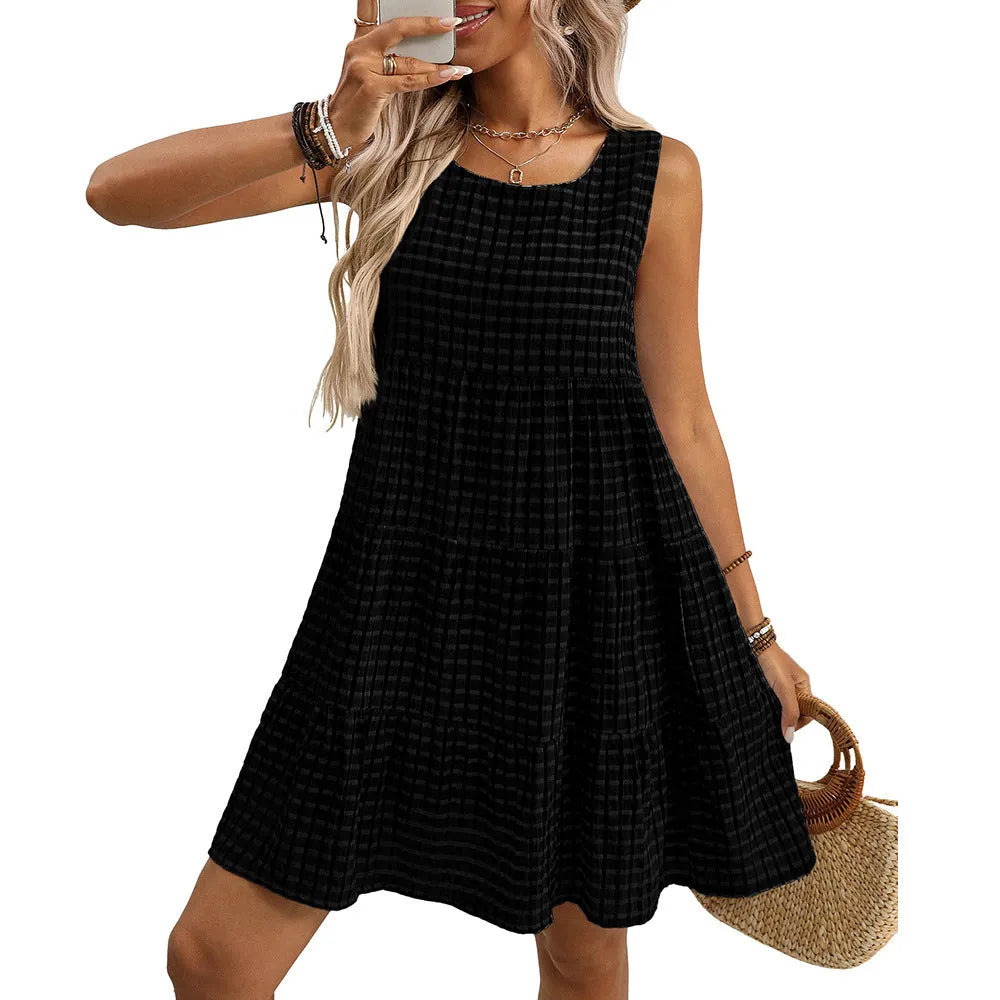 Women's sleeveless plaid dress with an oversized swing skirt in light blue.