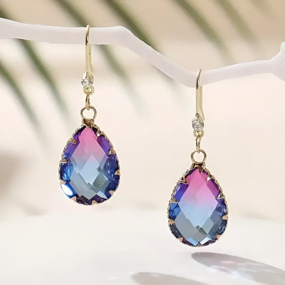 Coloured glass crystal heart-shaped earrings for women in blue, yellow, purple, and red styles.
