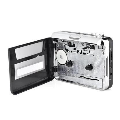 Silver USB cassette tape to MP3 converter unit with USB cable on a white background.