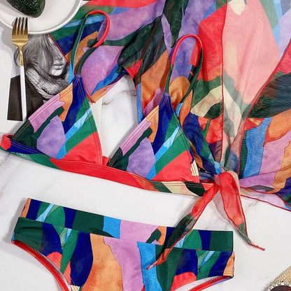 Red women's printed split swimsuit with briefs and bikini styling for swimming
